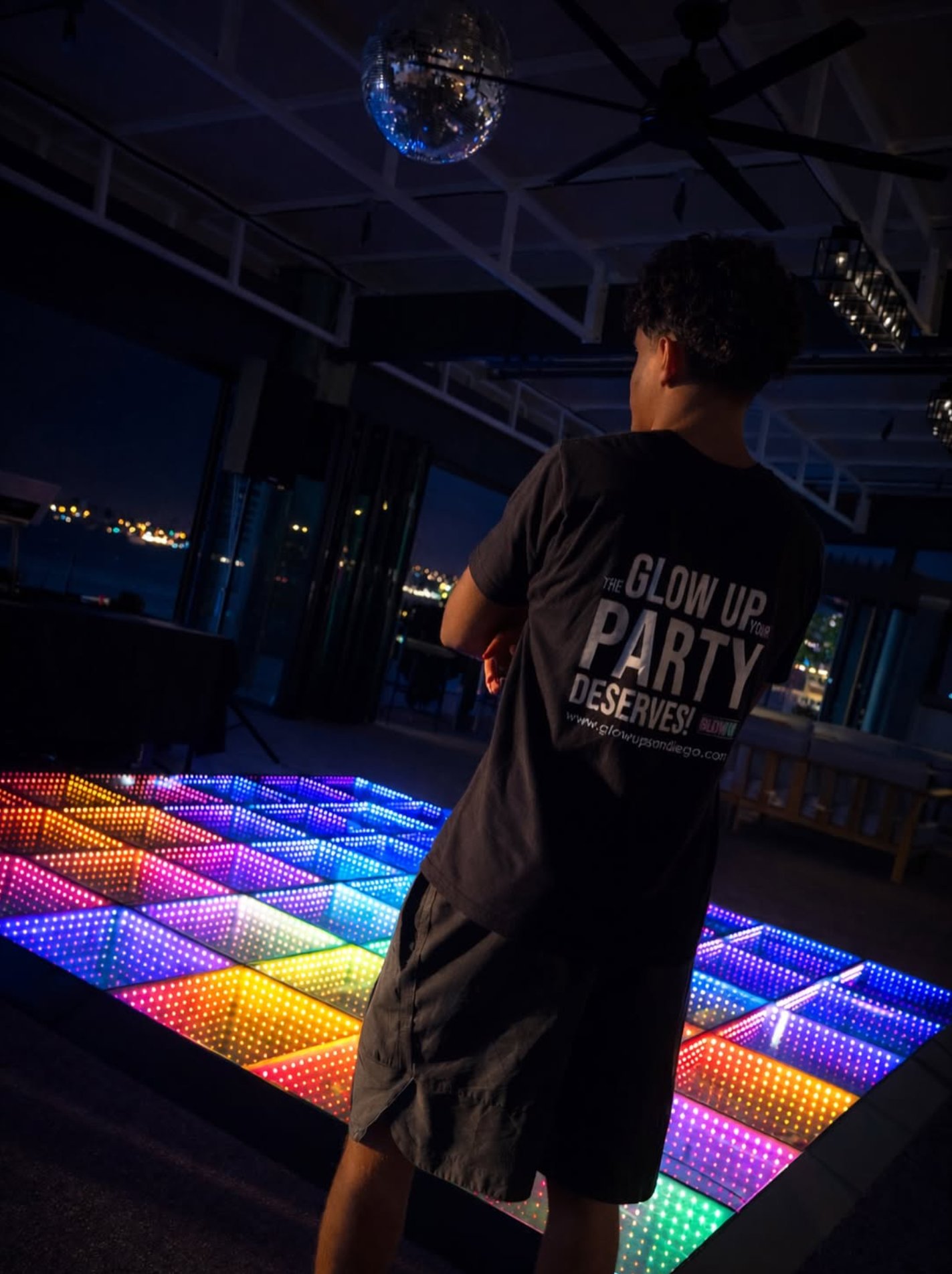 Colorful LED dance floor lit up at night